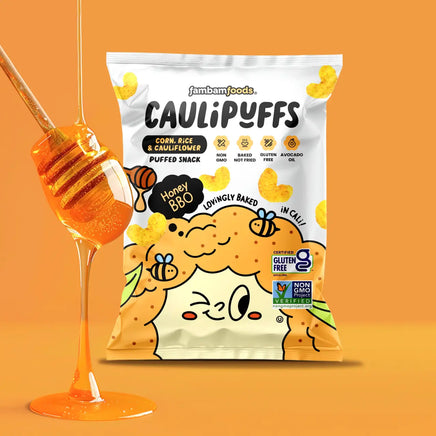 Bag of CauliPuffs Honey BBQ against an orange background with honey dripping from a honey dipper