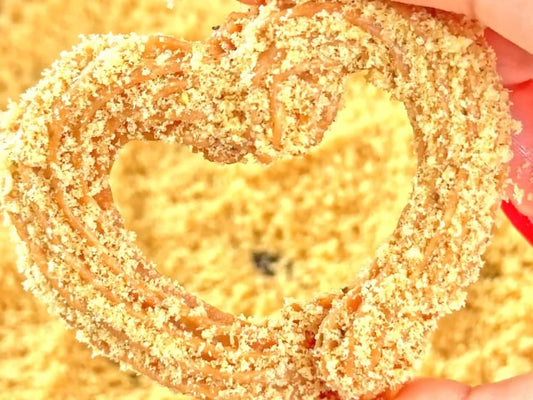Close up of a CauliPuffs heart shaped churro