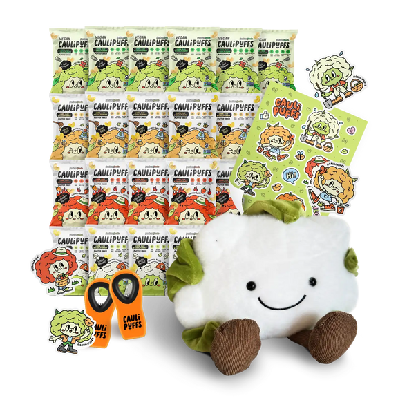 Cauli stuffie sat in front of all four flavors of puffs, alongisde the stickers and bag clips