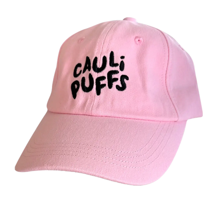 Pink baseball cap with CauliPuffs logo on the front